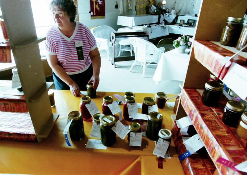 Marlene Klingenberg judges can goods during the Bureau County Fair in 1999.