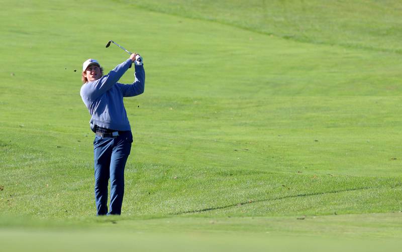 Cary-Grove’s Joey Boldt hits from the 5th fairway in Cary-Grove High School 2024 Invitational varsity golf action on Saturday, Sept. 7, 2024, at Foxford Hills Golf Club in Cary.