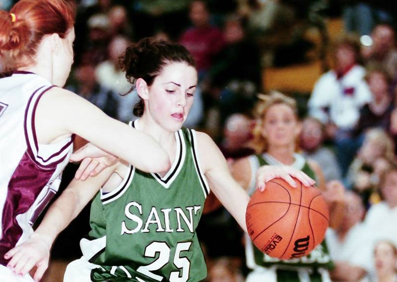 St. Bede's Sarah Slevin dribbles past a Rockridge player during the Sectional game on Feb. 14, 2000.