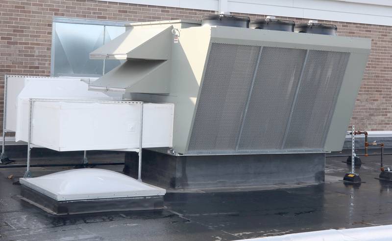 One of the new air conditioning units Thursday, Nov. 3, 2022, on the roof of Huntley Middle School.