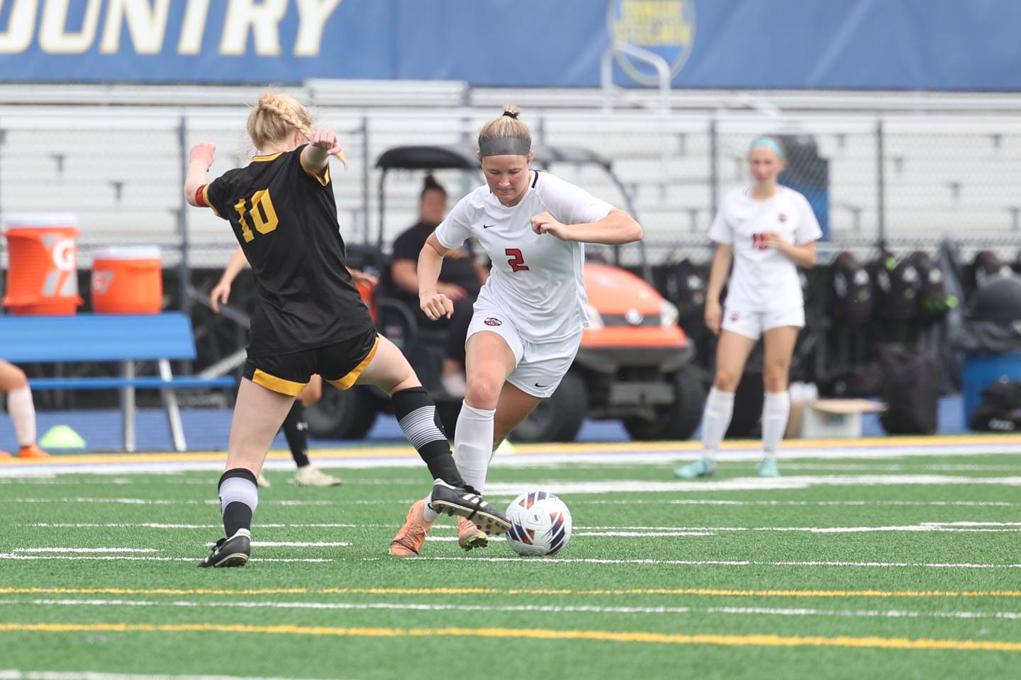 Lincoln-Way Central’s Madi Watt works around Andrew’s Bella Kreydich in the Class 3A Joliet Central Sectional championship match on Friday, May 24, 2024.