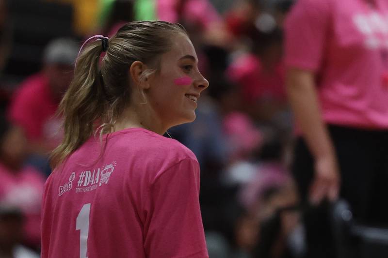Joliet West’s Ava Grevengoed is all smiles after a 25-5 set win against Joliet Central in the JTHS Pink Heals match. Tuesday, Oct. 4, 2022, in Joliet.