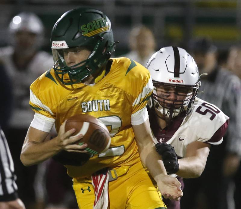 Prairie Ridge's Charles Newport chases down Crystal Lake South's Aidan Neyt during a Fox Valley Conference football game on Friday, Sept. 6, 2024, at Crystal Lake South High School.