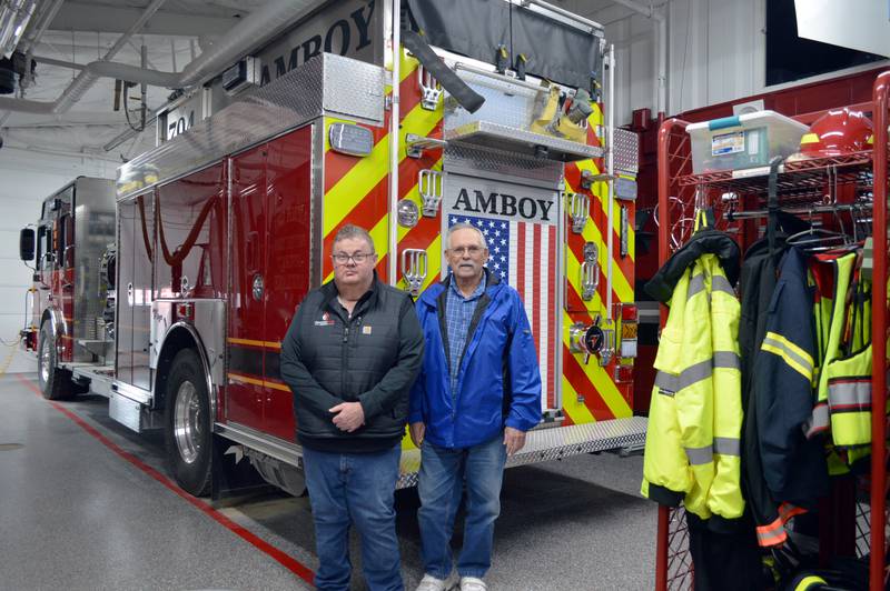Amboy Fire Chief Jeff Bryant Sr., left, and Harmon Acting Mayor Galen Hooper pose for a photo in the Amboy Fire Protection District fire station on Wednesday, Jan. 31, 2024. Amboy FPD and the Harmon Fire Department are working on a merging; a referendum will appear on the November ballot.