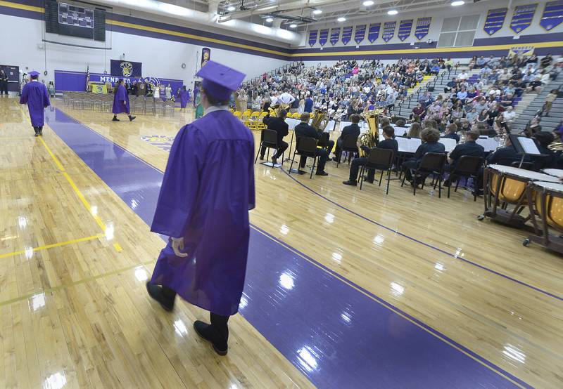 The class of 2024 enter the gymnasium at Mendota High School for graduation ceremony Saturday.