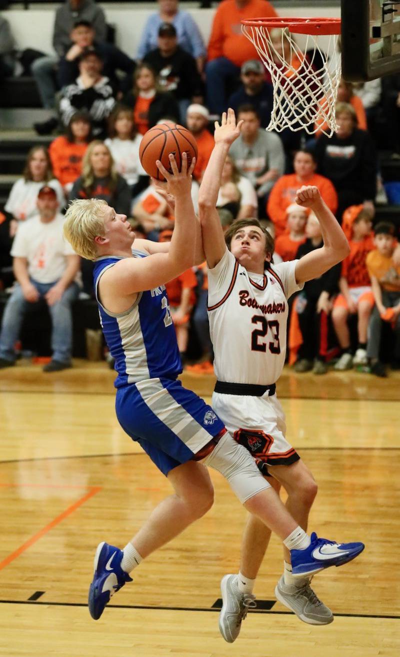 Princeton senior Daniel Sousa takes in layup attempt against Kewanee's Colson Welgatt at the end of the third quarter. He was knocked down on the play, made 1 of 2 free throw attempts and did not return