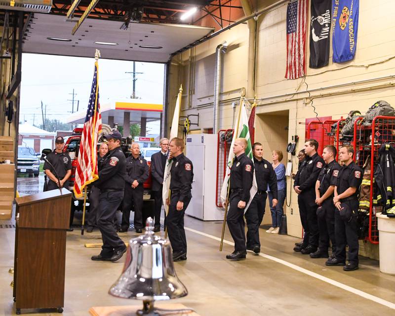 City of DeKalb firefighters present the colors at the start of a 9/11 remembrance ceremony held at Fire Station No. 1 in DeKalb on Sept. 11, 2022.