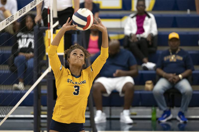 Sterling’s Delali Amankwa sets the ball against Rock Island Tuesday, Sept. 17, 2024.