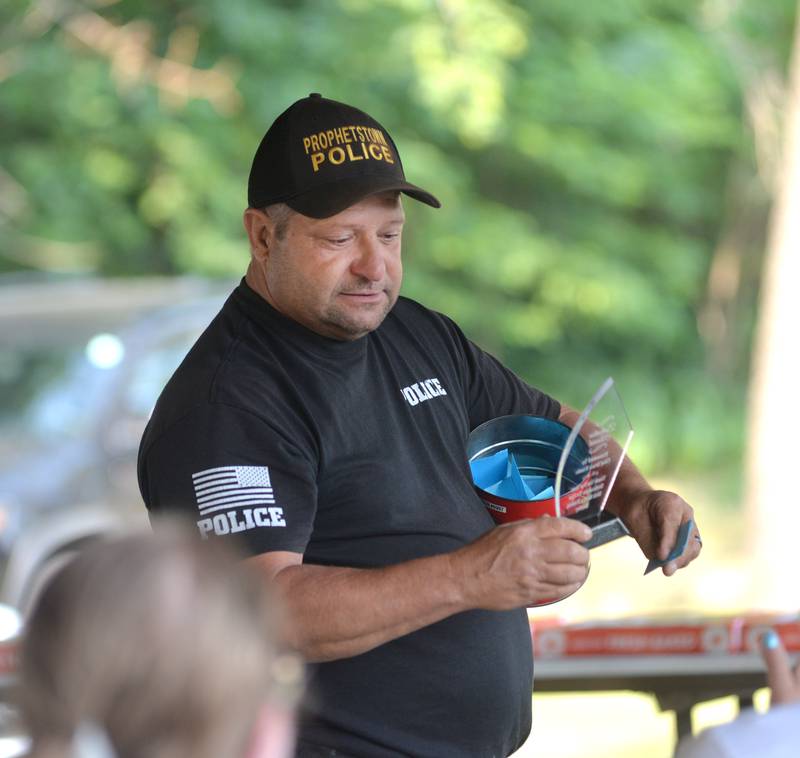 Prophetstown Police Chief Bruce Franks received a special award for running the Dick Brown Fishing Derby for kids for many years at Prophetstown State Park on Saturday. Franks will be retiring next year after 34 years with the police department.