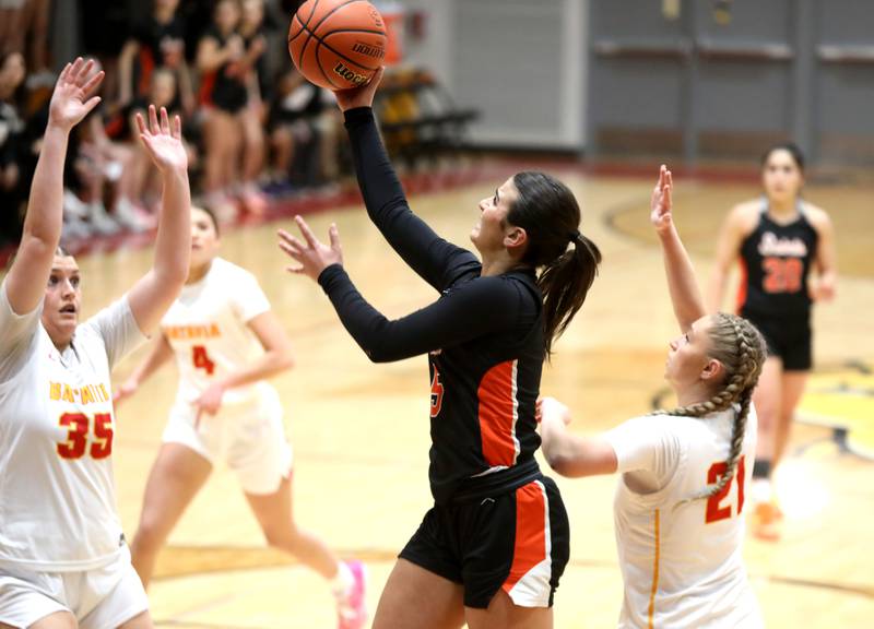 St. Charles East’s Lexi DiOrio goes up for a basket during a Class 4A Batavia Sectional semifinal game against Batavia at Batavia on Tuesday, Feb. 20, 2024.