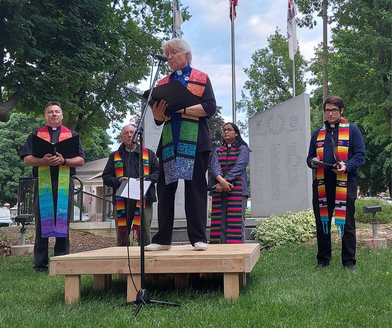 The Rev. Jennifer Amy-Dressler, of Open Table United Church of Christ, Ottawa, speaks Friday, June 7, 2024, during the Pride Night of Remembrance at Washington Square in Ottawa.