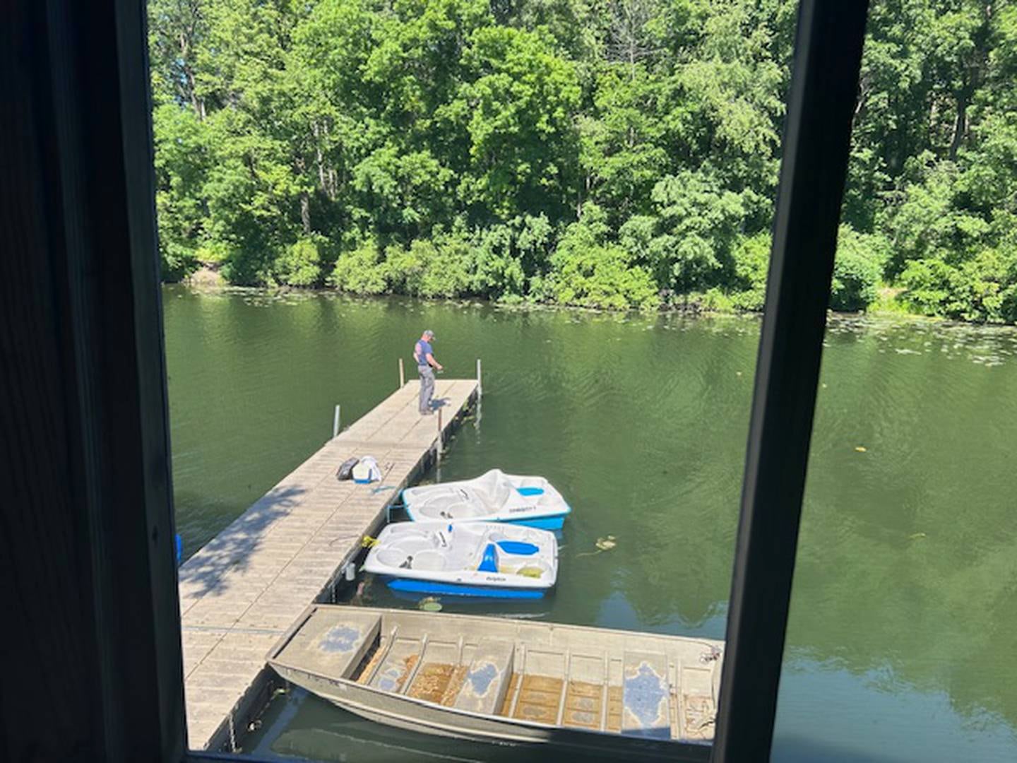 A fisherman is shown on the dock behind the Rockwood Restaurant and Marina on Friday, June 7, 2024.