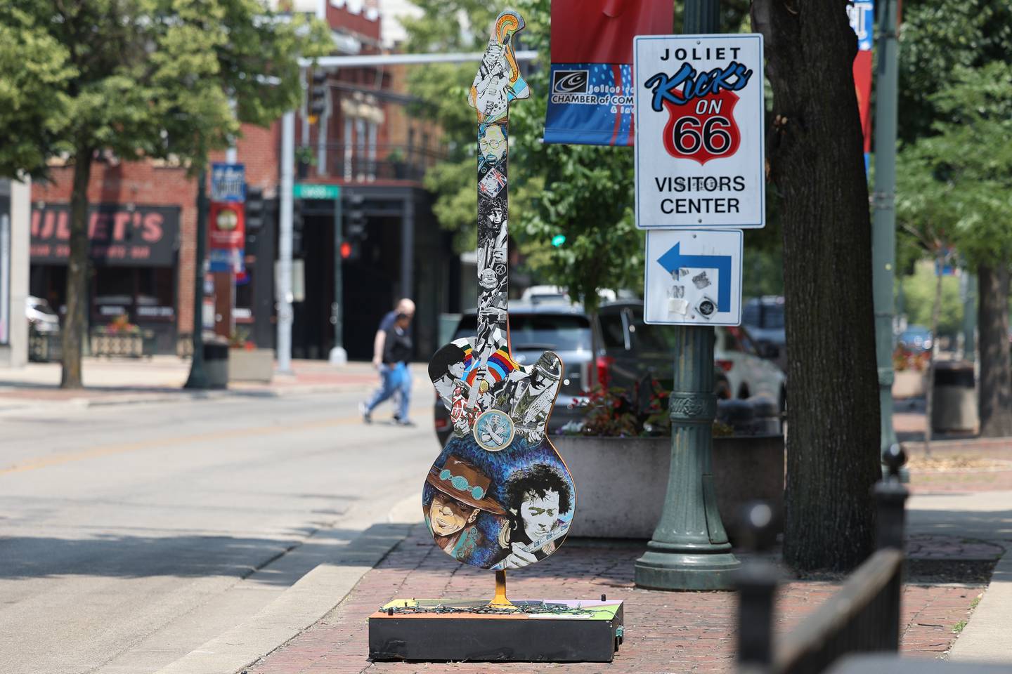 Commissioned guitar art sits along Chicago Street on Thursday, June 8, 2023, in Joliet.