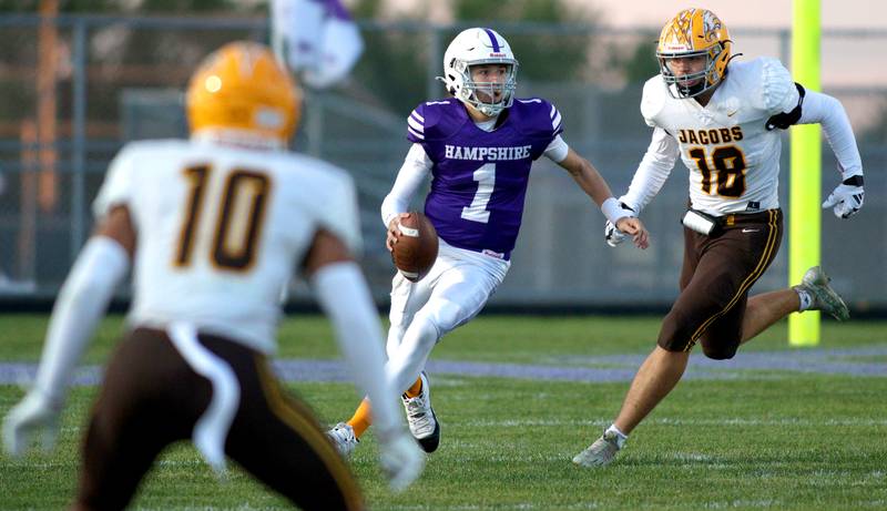 Hampshire’s Ryan Prowicz looks for an option against Jacobs in varsity football on Friday, Sept. 6, 2024, at Hampshire School in Hampshire.