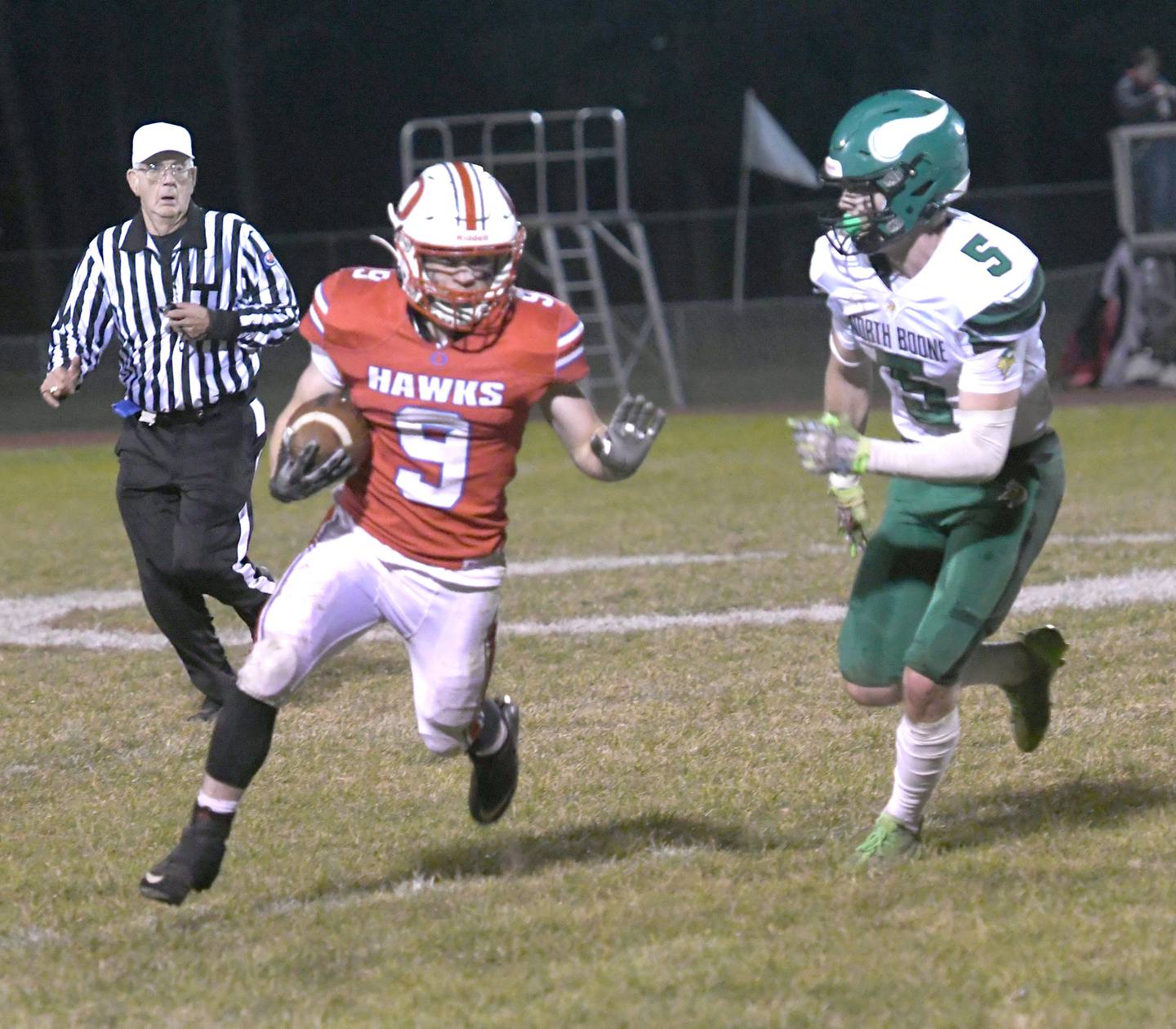 Oregon's Noah Reber turns the corner on a North Boone defender en route to the end zone during Oct. 21 action at Landers-Loomis Field in the final game of the season for the Hawks.