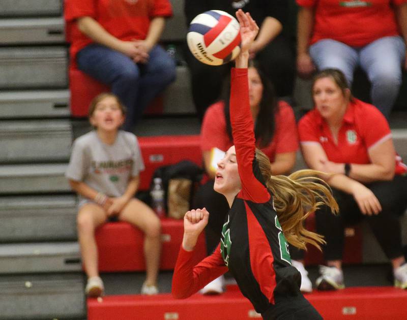 L-P's Addison Urbanski sends a kill past Geneseo in the Class 3A Regional on Tuesday, Oct. 24, 2023 at Sellett Gymnasium.