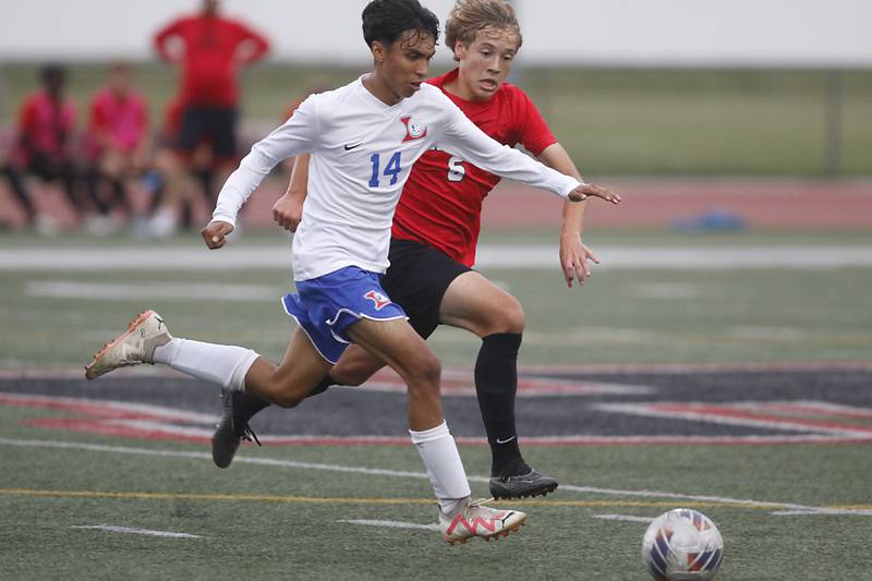 Larkin's Juan Cruz and Huntley's Max Bauer race to the ball during a nonconference soccer match on Thursday, Sept. 5, 2024, at Huntley High School.