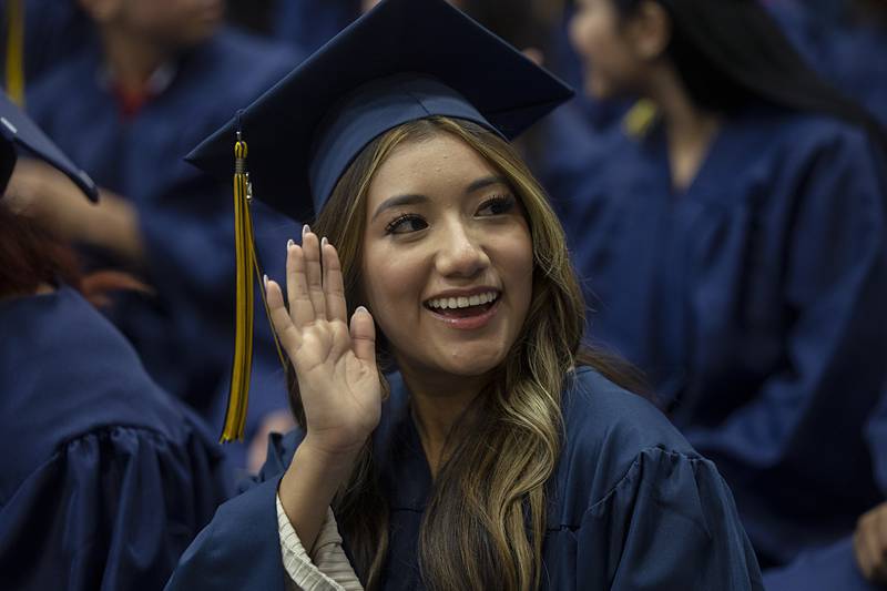 Sterling grads look and wave to loved ones Friday, May 24, 2024 during the class of 2024 commencement ceremony.