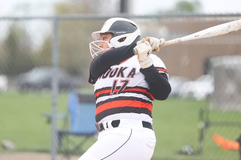 Minooka’s Jaelle Hamilton connects against Oswego on Wednesday, April 17, 2024 in Minooka.