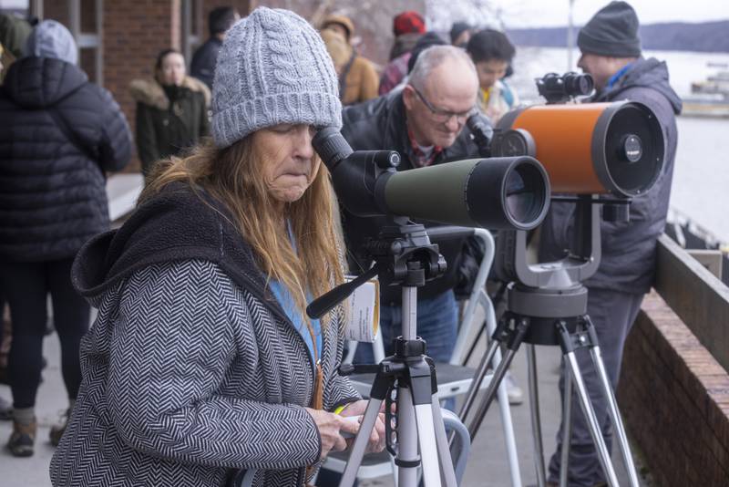 Joanne Fitzgerald was one of many guests who came to the Illinois Waterway Visitors Center on January 28, 2024 in hopes of seeing bald eagles. Spotting scopes were focused on nests located on Plum Island.