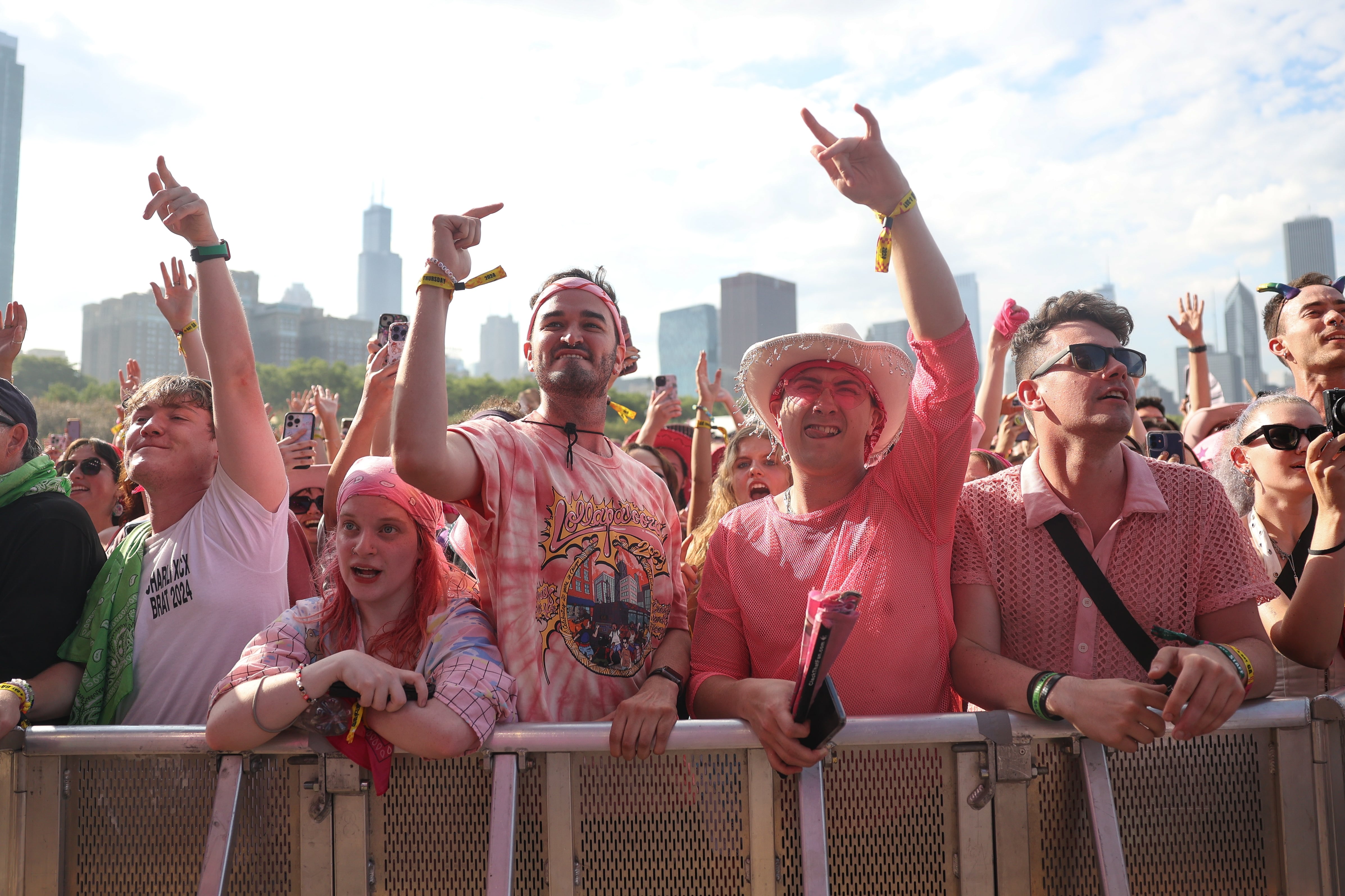 Chappell Roan fans wear pink for her performance at Lollapalooza on Aug. 1, 2024 in Chicago.