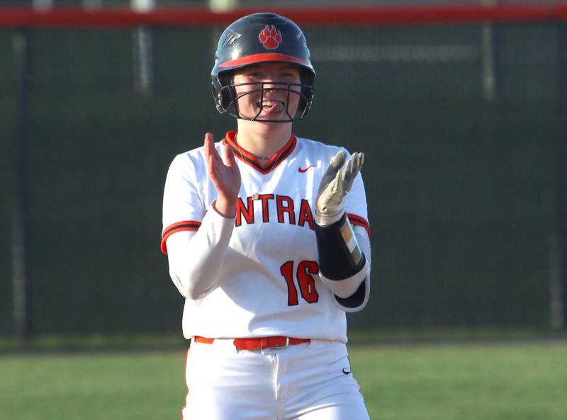 Crystal Lake Central’s Cassidy Murphy is all smiles after stroking a game-tying double against Woodstock North in varsity softball at Crystal Lake Friday.