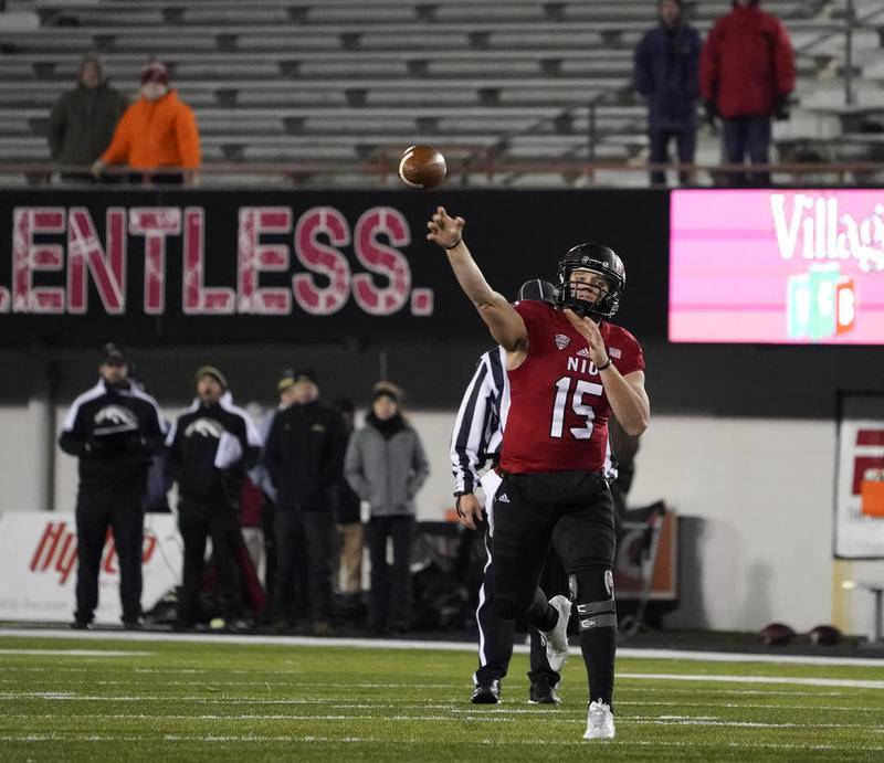 NIU quarterback Marcus Childers (15) throws a touchdown pass to tight end Mitchell Brinkman (not pictured) during a game against the Western Michigan Broncos at Huskie Stadium in DeKalb November 15.