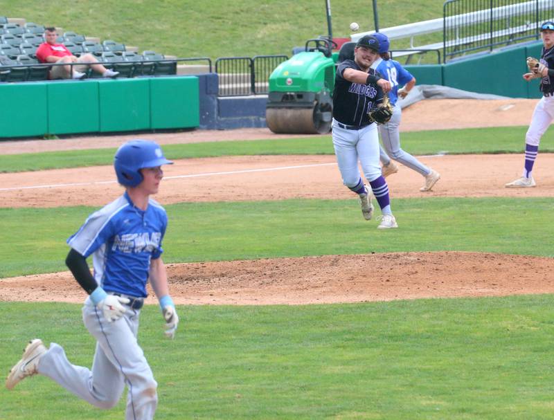 Wilmington's Zach Ohlund throws to first to force out Newman's Liam Nicklaus during the Class 2A third place game on Saturday, June 1, 2024 at Dozer Park in Peoria.