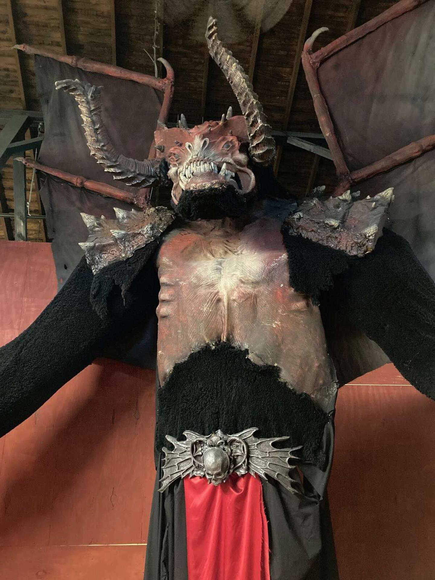 A huge demon is among about 50 animatronic figures Miles McCabe plans to use to scare patrons of 5 Points Haunted House.