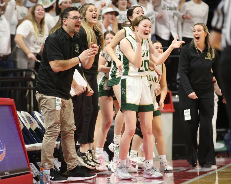 St. Bede's Lili McClain reacts after teammate Savannah Bray scores seconds before halftime during the Class 1A State semifinal game on Thursday, Feb. 29, 2024 at CEFCU Arena in Normal.