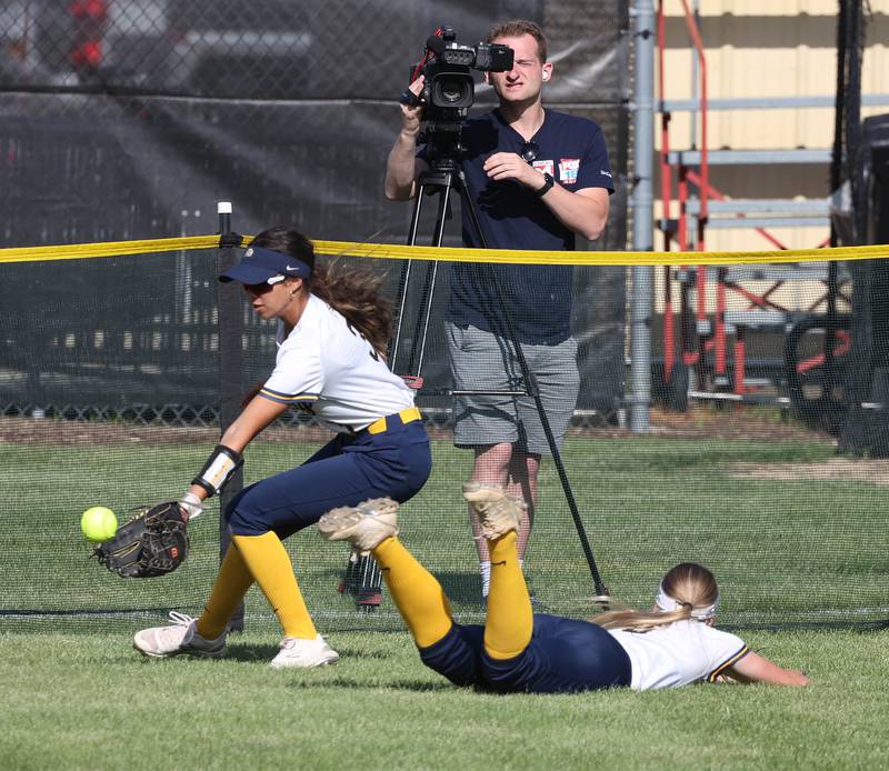 Sterling's Lilly Cantu plays the ball on a bounce after it gets by a diving Olivia Melcher during their Class 3A sectional semifinal against Prairie Ridge Wednesday, May 29, 2024, at Sycamore High School.