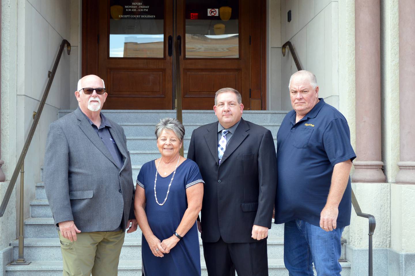 Ogle County Economic Development Corporation officers pose for a photo outside the Old Ogle County Courthouse on Aug. 17, 2023. Left to right are Treasurer and Byron Mayor John Rickard; Secretary and Mt. Morris Economic Development Corporation Executive Director Paula Diehl; Vice President and Oregon City Manager Darin DeHaan; and President and Polo City Councilperson Randy Schoon.