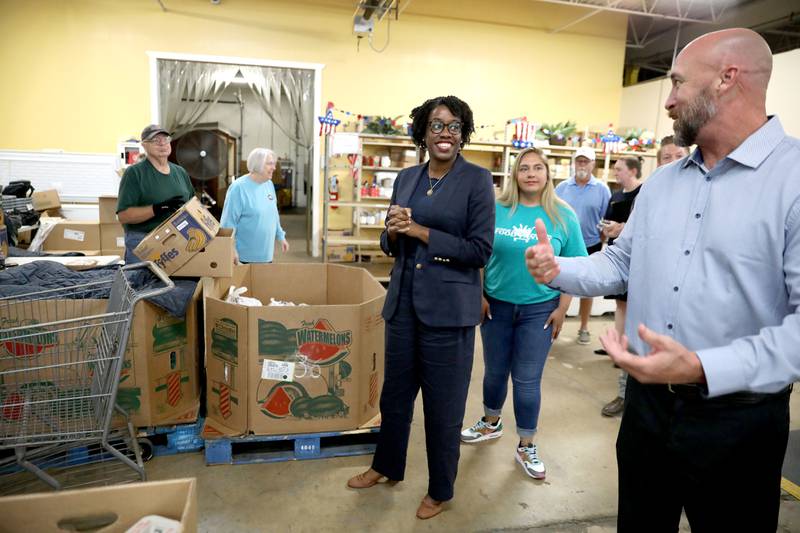 Alex Hurd (far right), executive director of the Kendall County Food Pantry, gives a tour of the Yorkville facility to U.S. Rep. Lauren Underwood (far right) with Assistant Director Dulce Vargas (center) on Monday, July 1, 2024. Congressman Underwood was there to present $763,500 for the pantry to rehabilitate the the facility including resurfacing the flooring, installing emergency pathway lighting and handicap entry doors.