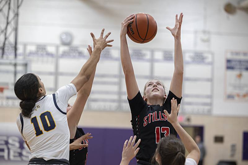 Stillman Valley’s Mya Janssen hauls in a rebound against Sterling Thursday, Dec. 28, 2023 at the Dixon KSB Holiday tournament.