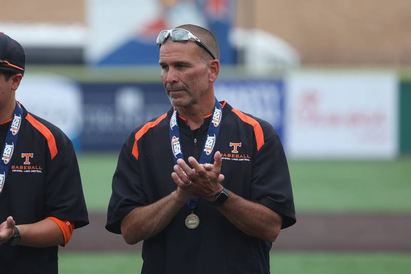 Crystal Lake Central assistant head coach Jeff Aldrdge recieves his state championship medal after their win against Lemont in the IHSA Class 3A Championship game on Saturday June 8, 2024 Duly Health and Care Field in Joliet.
