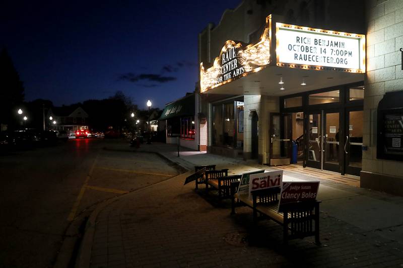 Campaign signs sit on a bench outside the Raue Center for the Arts, 26 N. Williams St. in Crystal Lake, during a Republican meet-and-greet event Wednesday, Oct. 12, 2022.  The event gave voters a chance to discuss a number of key issues and talk with candidates.