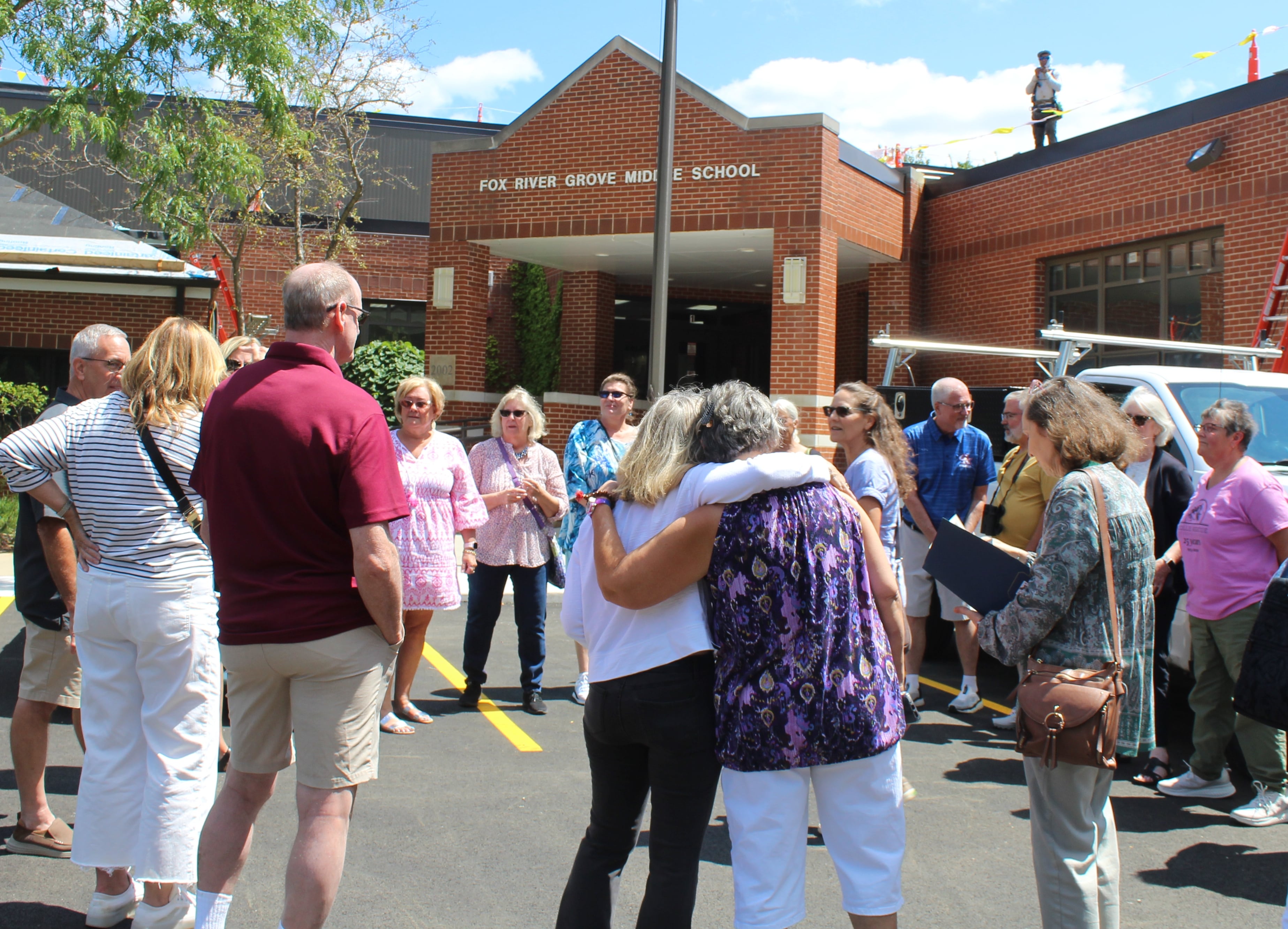 The Fox River Grove Orchard School class of 1974 gathers at the school, now named Fox River Grove Middle School, on Saturday, Aug. 10, 2024.