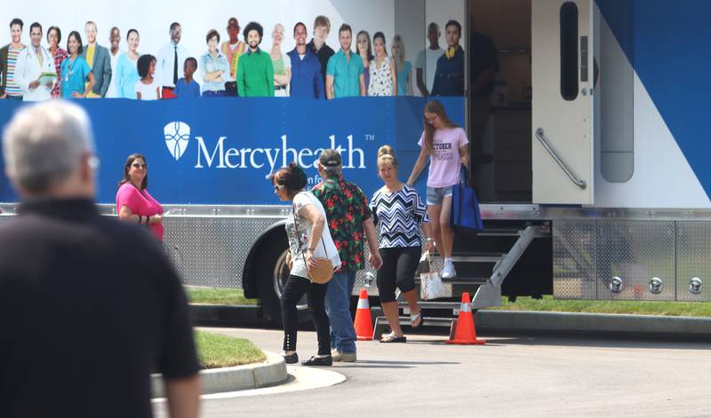 Visitors check out a mobile health clinic during a public open house for the new Mercyhealth hospital in Crystal Lake on Saturday.