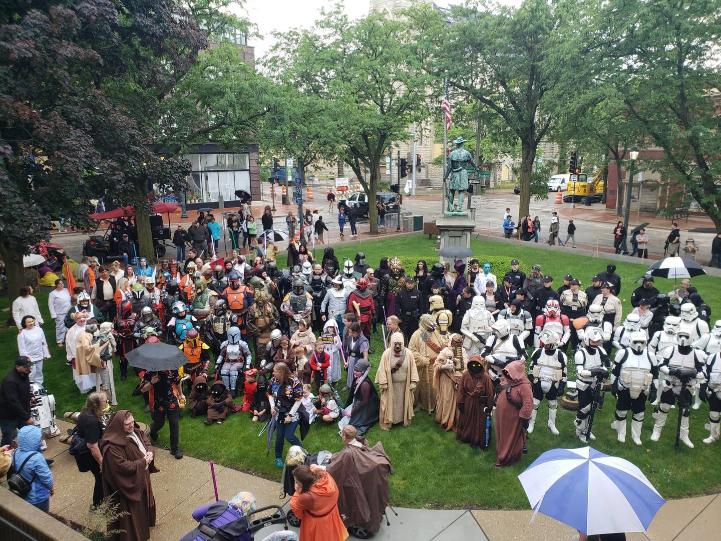 Cosplayers from the 501st Legion Midwest Garrison and its sister organizations pose on the lawn of the Joliet Library.