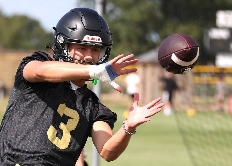 Sycamore’s Carter York catches a pass Monday, Aug. 12, 2024, during practice at the school.