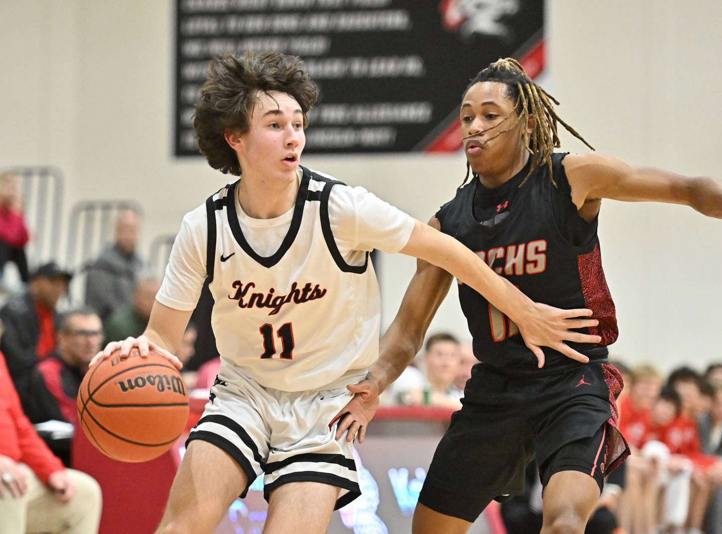 Lincoln-Way Central's Kevin Barrett tries to get by a defender during a conference game against Bradley on Friday, Feb. 09, 2024, at New Lenox. (Dean Reid for Shaw Local News Network)