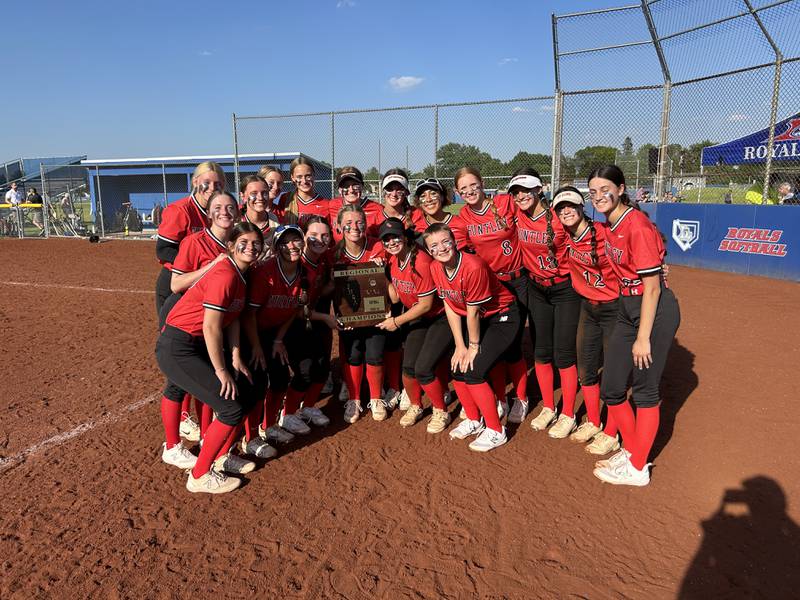 Huntley players pose with their plaque after beating McHenry, 17-1, on Thursday to win the Class 4A Larkin Regional championship in Elgin.