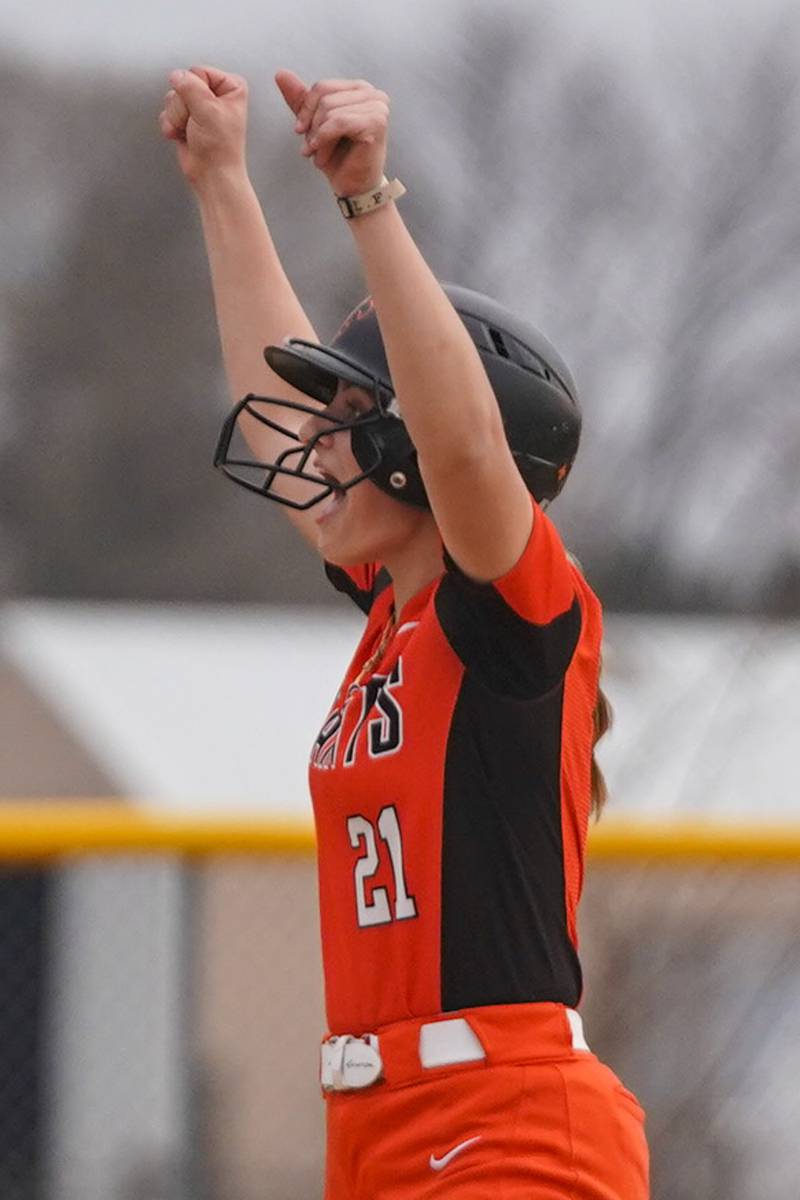 St. Charles East's Hayden Sujack (21) reacts after hitting her second double of the game against Oswego East during a softball game at Oswego East High School on Wednesday, March 13, 2024.