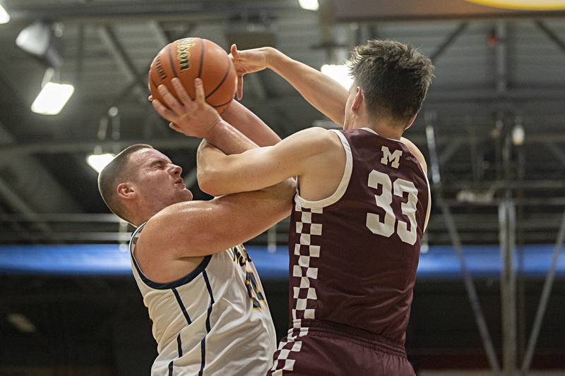 Sterling’s Lucas Austin and Moline’s Aiden Versus get tangled up  Friday, Dec. 1, 2023 in Sterling.