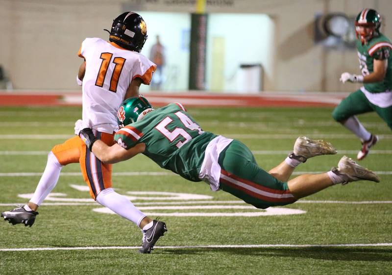 L-P's Dane Wicinski dives to make a tackle on United Township's Jasiah Massey on Friday, Aug. 30, 2024 at Howard Fellows Stadium.