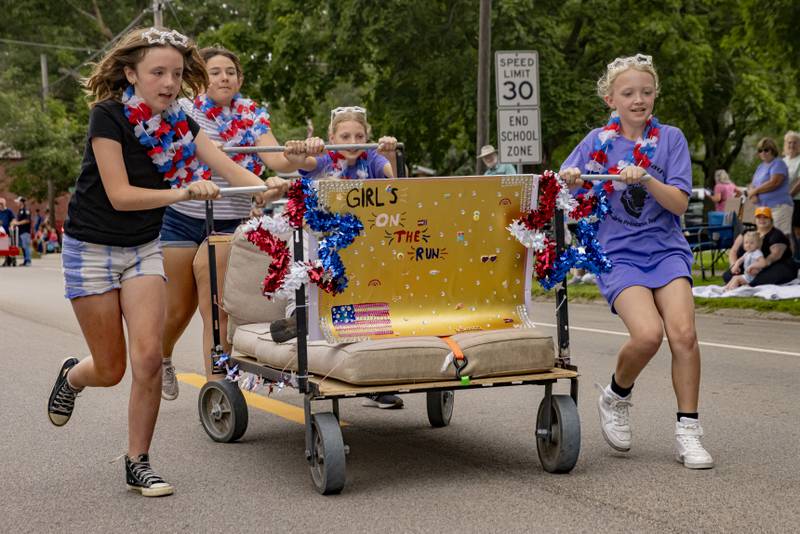 Team Girls On The Run compete Saturday, June 8, 2024, during the bed races at Buffalo Days in La Moille.