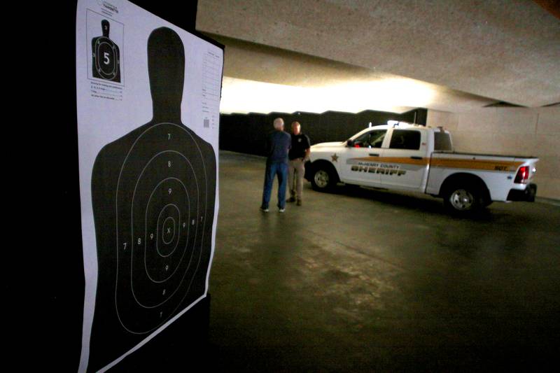 People check out the firing range during an open house at The McHenry County Regional Training Center in Cary Tuesday evening.