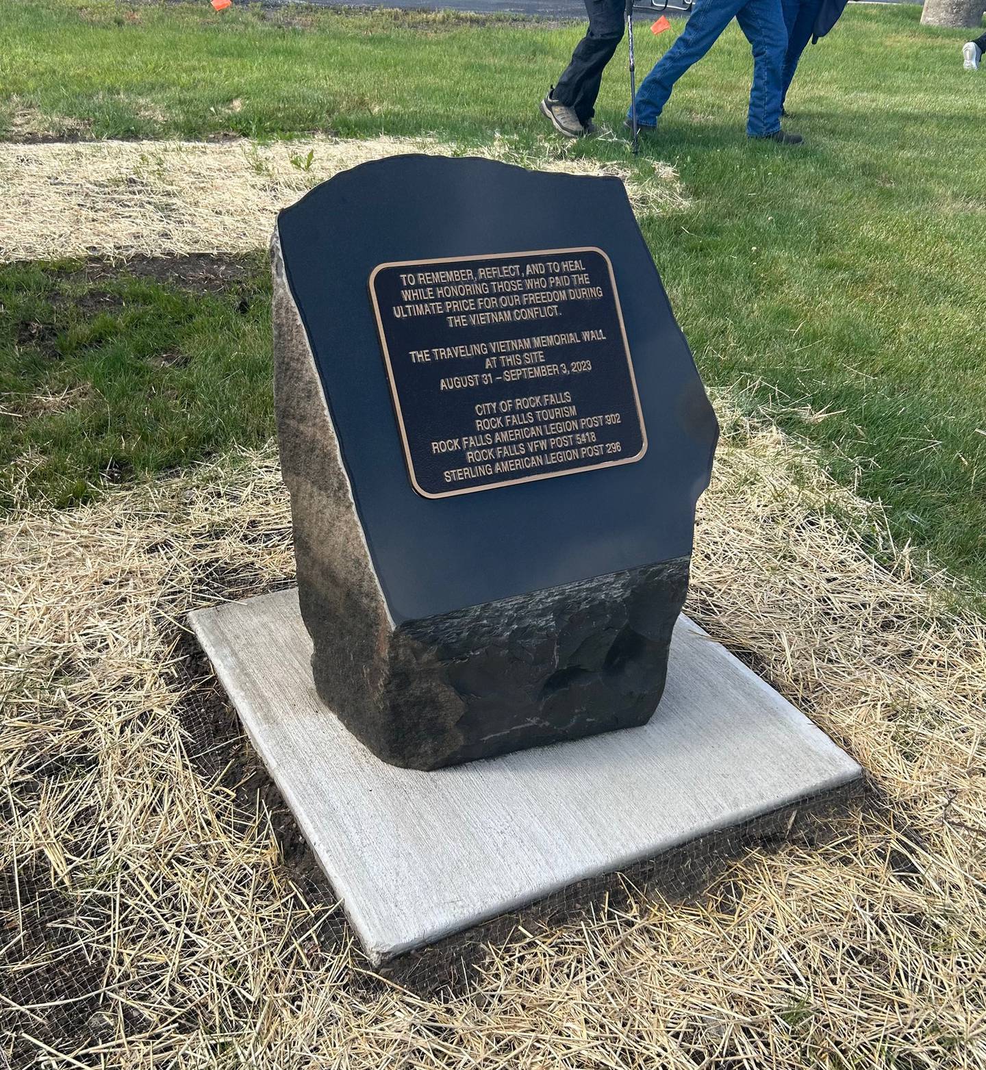 A plaque commemorating the Traveling Vietnam Memorial Wall display in Rock Falls last year was dedicated Monday at the RB&W District.