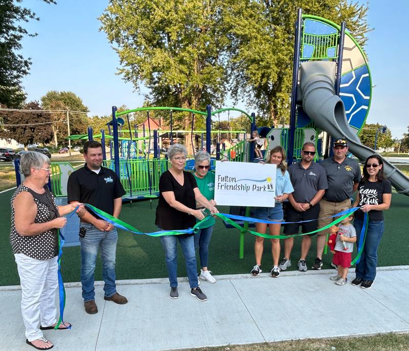 Fulton Mayor Wendy Ottens (third from left) gets ready to cut the ribbon Sept. 10 at the grand opening of the newly renovated Fulton Friendship Park.