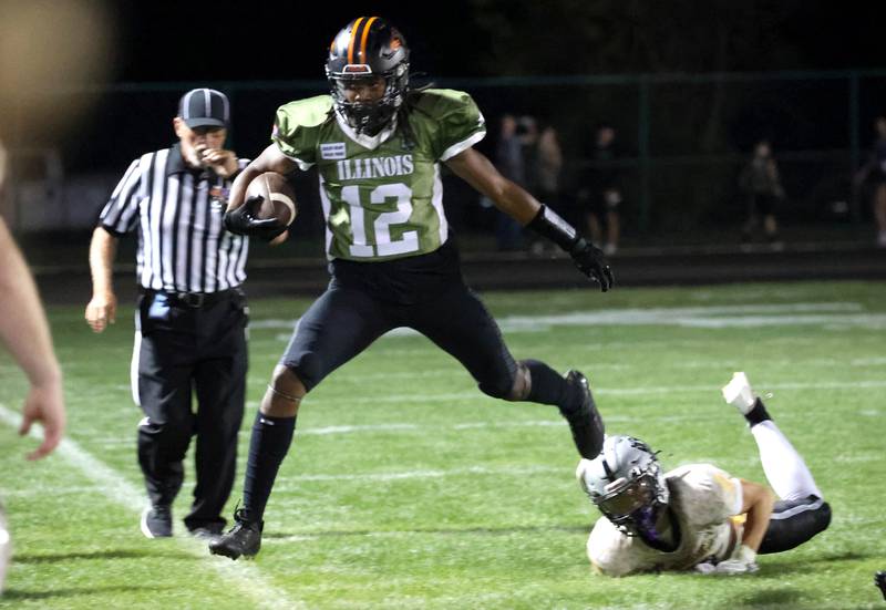 DeKalb's Derrion  Straughter is pushed out of bounds by Kaneland's Luke Gadomski during their game Friday, Sept. 13, 2024, at Kaneland High School in Maple Park.